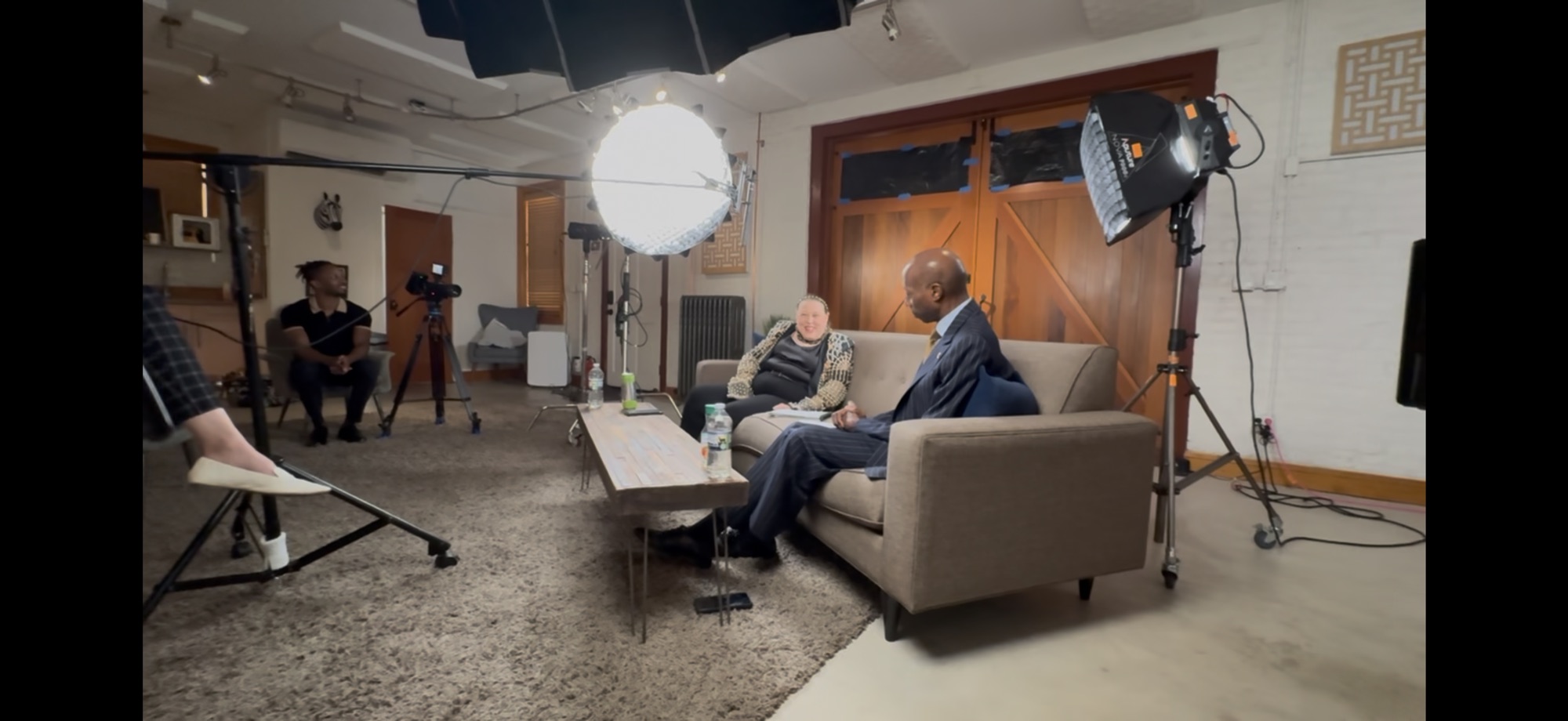 Studio interview production with professional lighting