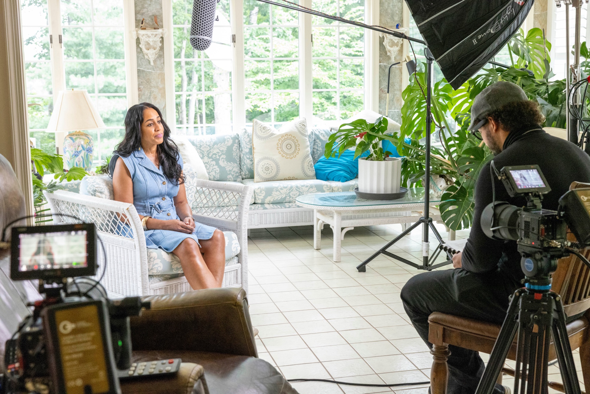 Frame + Focus filming a client interview on location with full lighting and audio